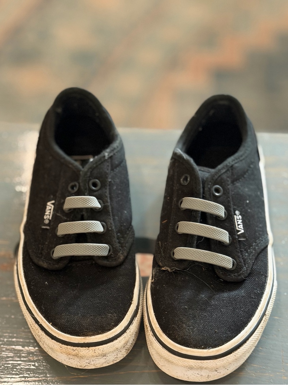 Vans Kids Black Canvas Slip-On Style Sneakers with Gray Elastic Laces